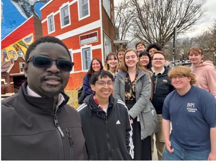 Dr. Gana Ndiaye and Logan Museum Assistant Curator Leeann Ream touring the Pilsen Neighborhood with students from ANTH 275 Global Cities.